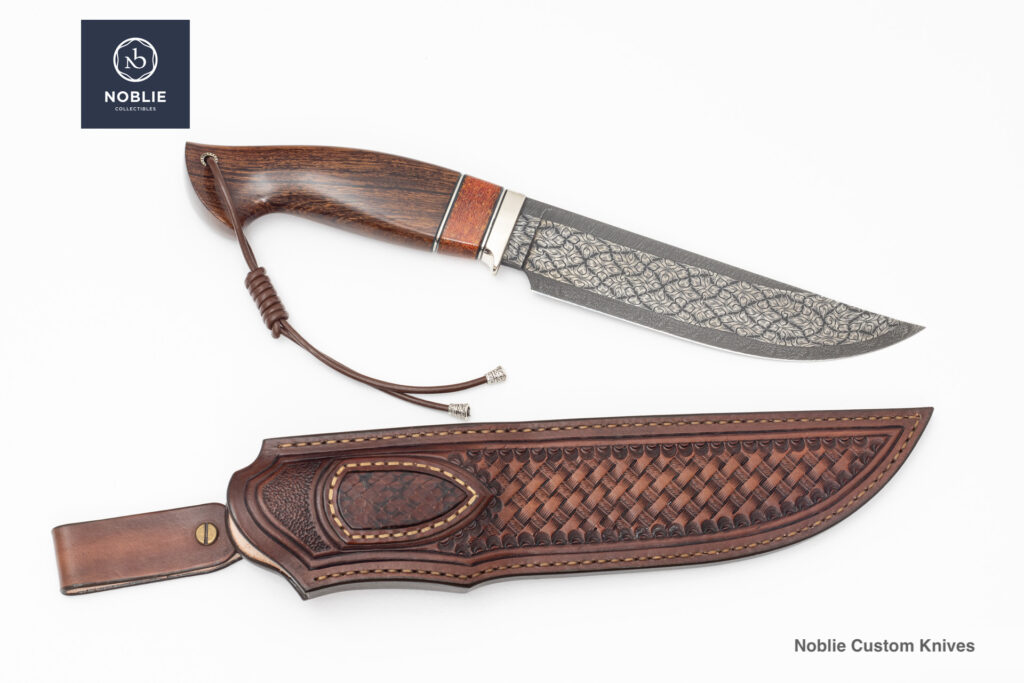 Custom mosaic Damascus fixed blade knife with polished wood handle, leather lanyard, and tooled leather sheath