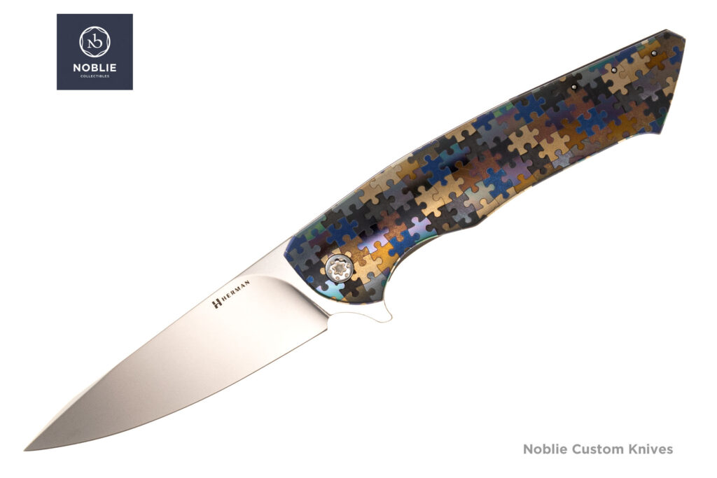 Herman Knives Slim M398 open presentation side with multicolor Puzzle titanium handle