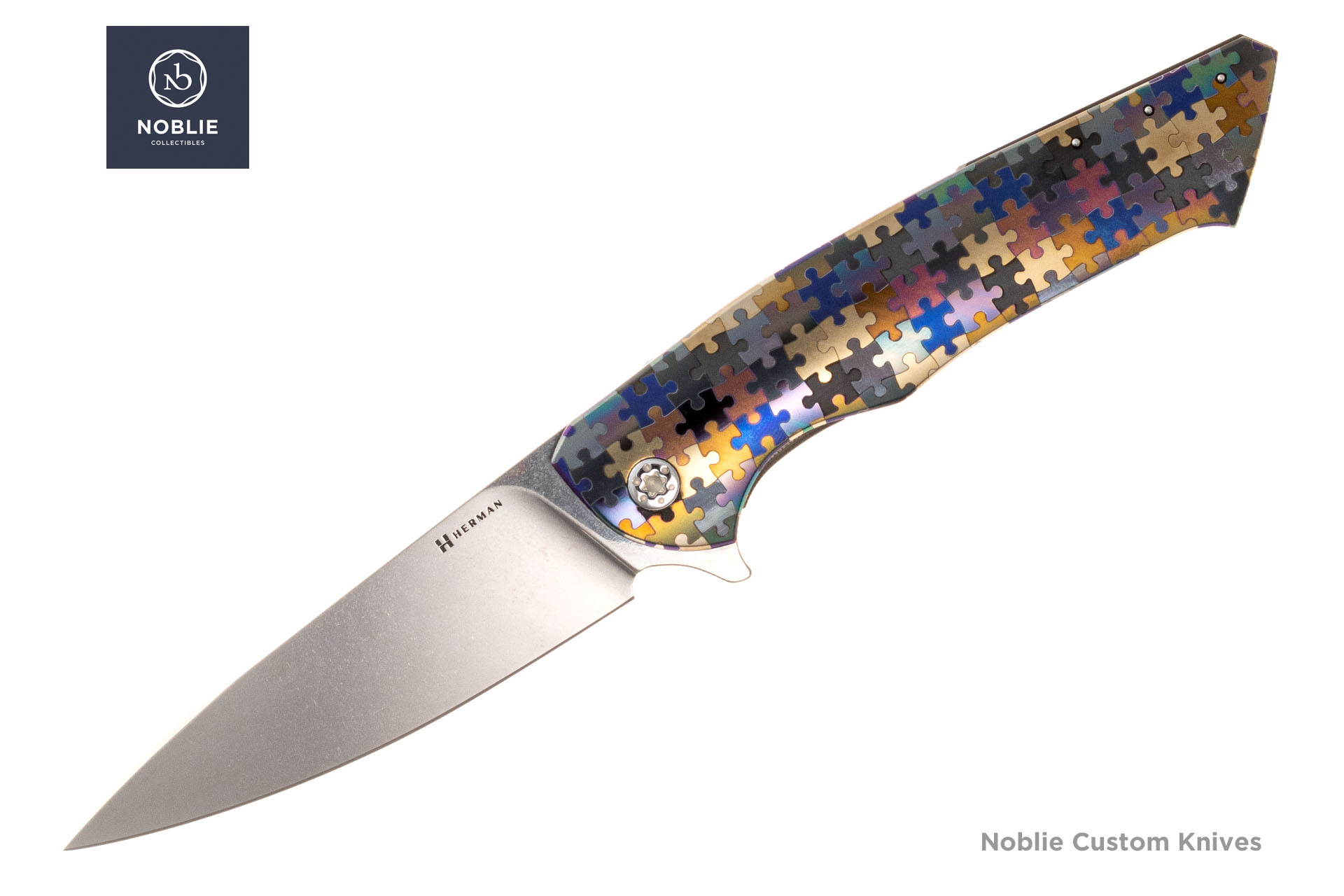 Herman Knives Slim M390 összecsukható kés, nyitott oldalú, többszínű Puzzle titán nyéllel